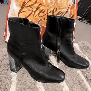 Super cool black Steve Madden ankle boots with marble heels!